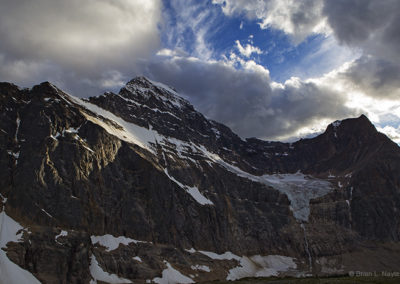 Alpine peaks catch a fringe of light