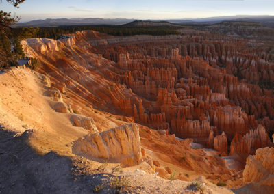 Morning light shines warmly upon a sea of rocky spires