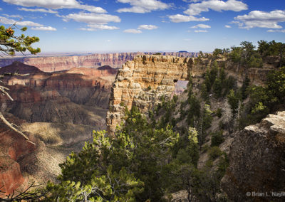 Dramatic skies over Grand Canyon arch