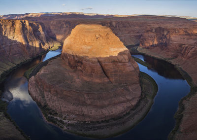 Horseshoe Bend, Colorado River canyon fringed by morning light