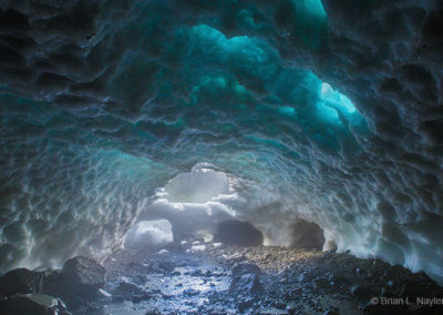 Ice cave in a blue light