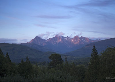 Evening lit peaks and late day skies