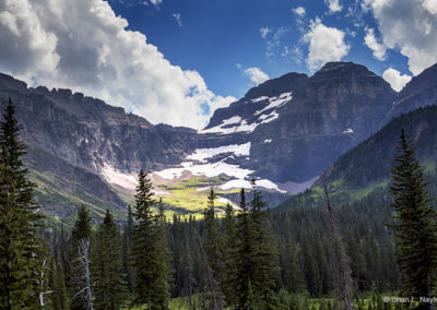 Mountain highlights ringed by summer clouds