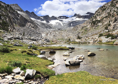 Pristine lake surrounded by Alpine peaks