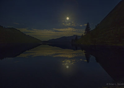 Moonlight over mountain lake