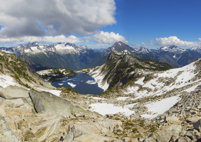 High alpine lake with ice and snow