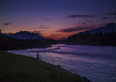 Late skies over river currents