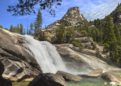 High alpine falls in summer light