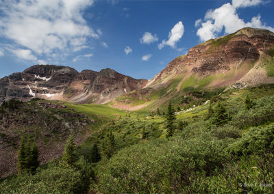 Sunny highlights, mountain peaks and blue skies