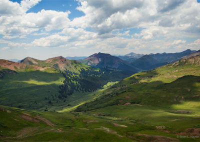 Cloud and shadow overtake mountain pastures